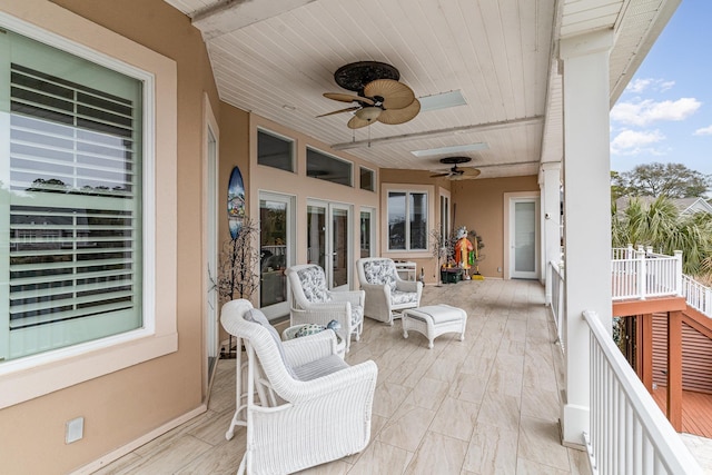 view of patio featuring french doors and ceiling fan