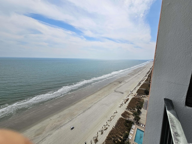 view of water feature with a beach view