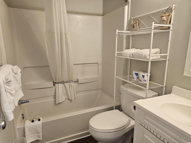 full bathroom featuring toilet, vanity, and shower / bathtub combination with curtain