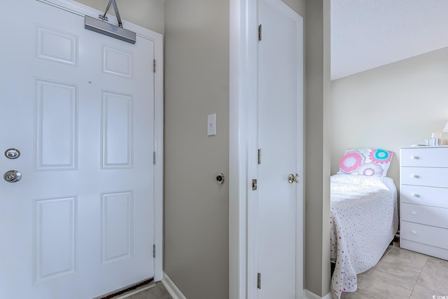 interior space featuring light tile patterned flooring