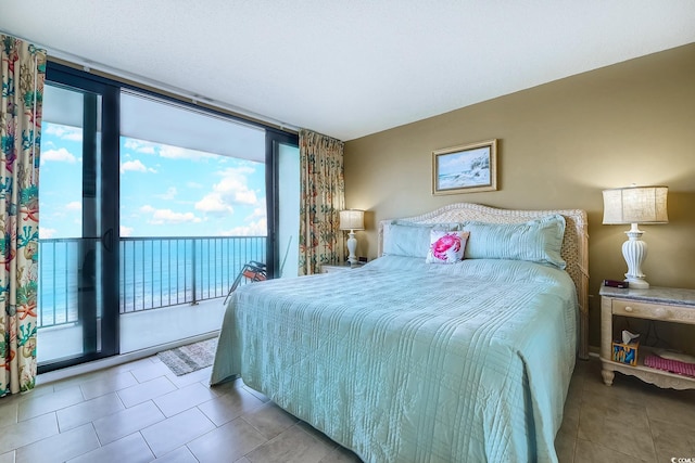 tiled bedroom with access to exterior