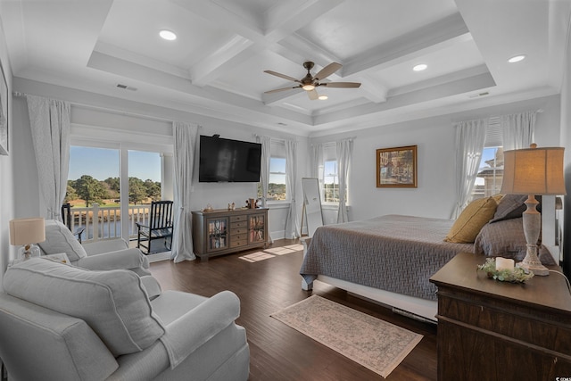 bedroom with access to outside, multiple windows, wood finished floors, and visible vents