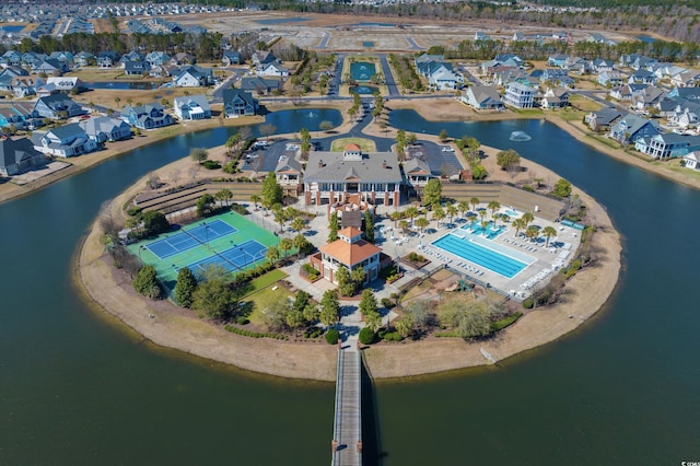 bird's eye view featuring a residential view and a water view