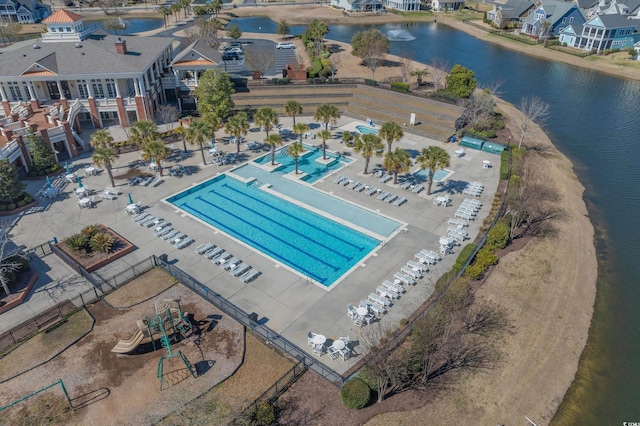 drone / aerial view with a residential view and a water view