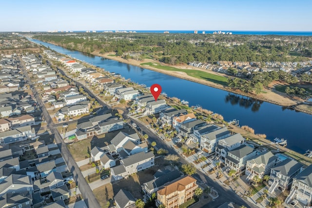 birds eye view of property featuring a residential view and a water view