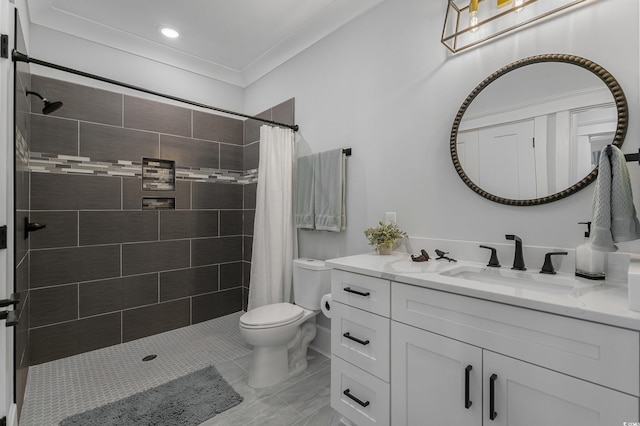 bathroom featuring tiled shower, toilet, vanity, and crown molding