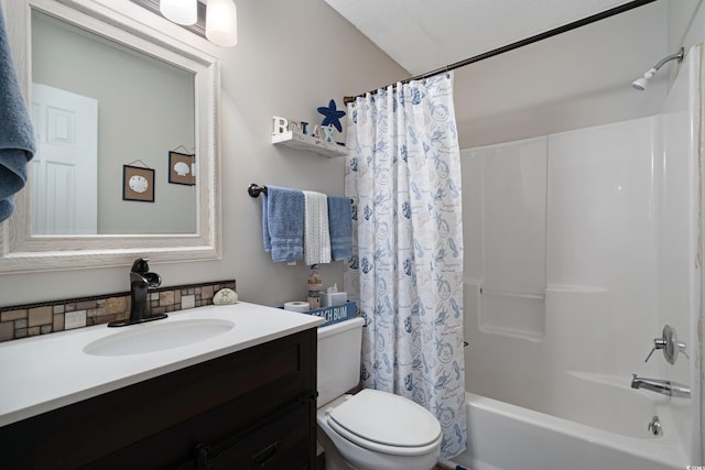 full bathroom featuring vanity, toilet, and shower / bath combo with shower curtain