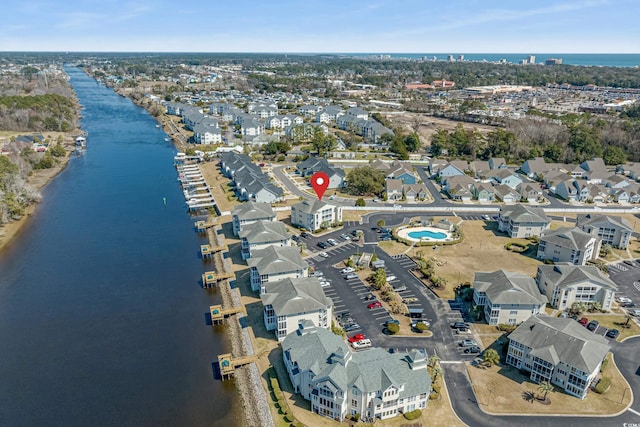 aerial view featuring a residential view and a water view