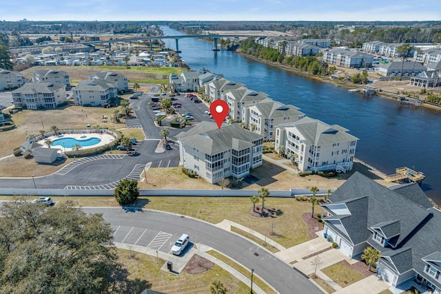 drone / aerial view featuring a water view