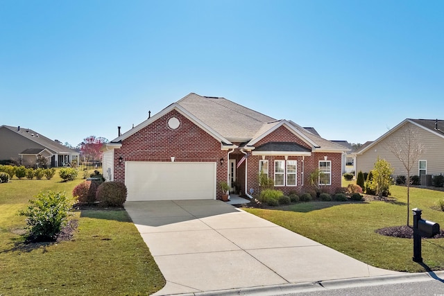 view of front of home featuring a front yard, an attached garage, brick siding, and driveway