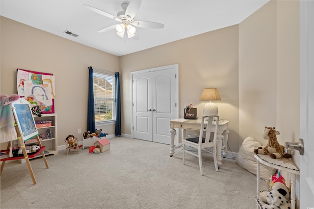 playroom with a ceiling fan, visible vents, carpet floors, and baseboards