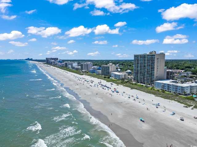 bird's eye view featuring a city view, a beach view, and a water view