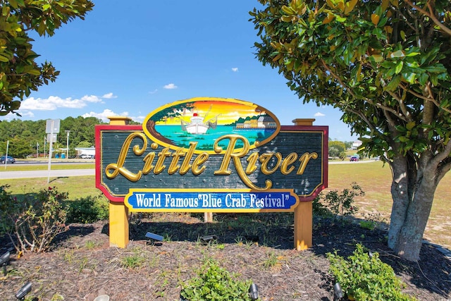 view of community sign