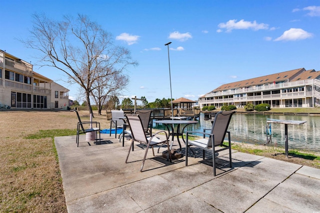 view of patio / terrace with a water view
