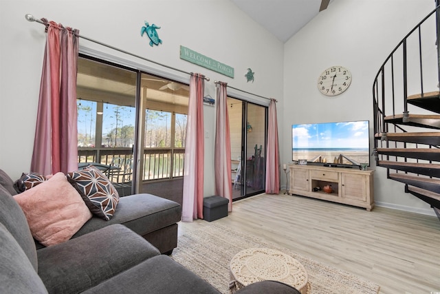 510 Fairwood Lakes Dr Unit 18-P, Myrtle Beach, SC 29588 - living room featuring stairway, high vaulted ceiling, baseboards, and wood finished floors