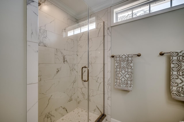 bathroom with a marble finish shower and ornamental molding