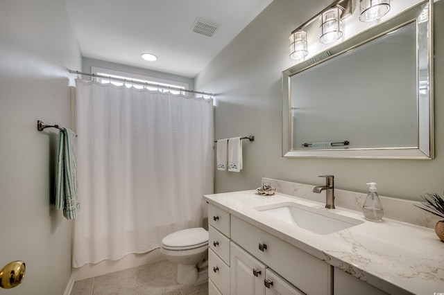 full bathroom featuring tile patterned flooring, visible vents, toilet, shower / bath combo, and vanity