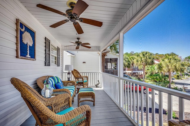 wooden deck with ceiling fan