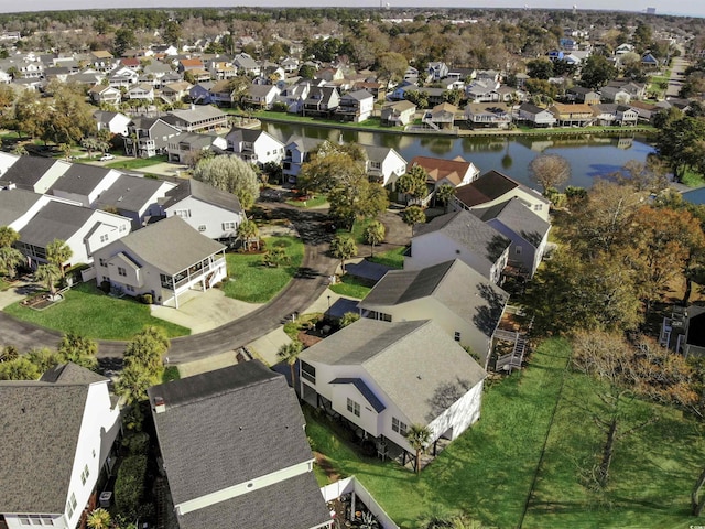 aerial view with a residential view and a water view