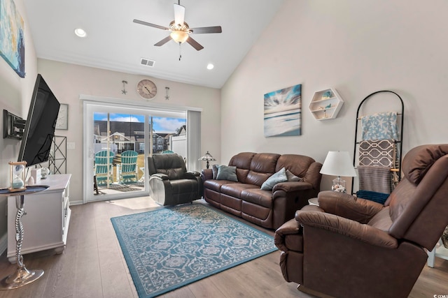 living room featuring visible vents, ceiling fan, recessed lighting, wood finished floors, and high vaulted ceiling