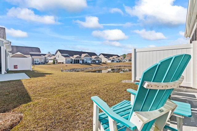 view of yard featuring a residential view