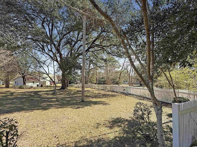 view of yard featuring fence