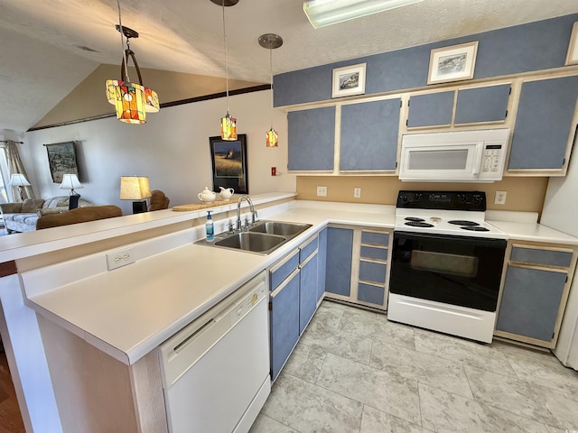 kitchen with open floor plan, light countertops, a peninsula, white appliances, and a sink