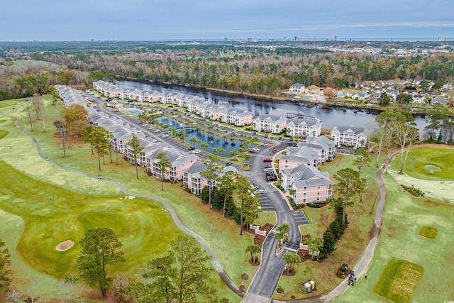 drone / aerial view featuring a water view and view of golf course