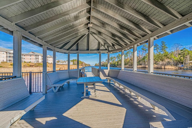 wooden deck with a gazebo and a water view