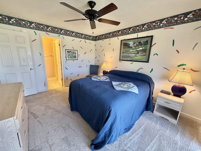 bedroom with light colored carpet and ceiling fan