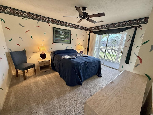 carpeted bedroom with ceiling fan, access to outside, visible vents, and a textured ceiling