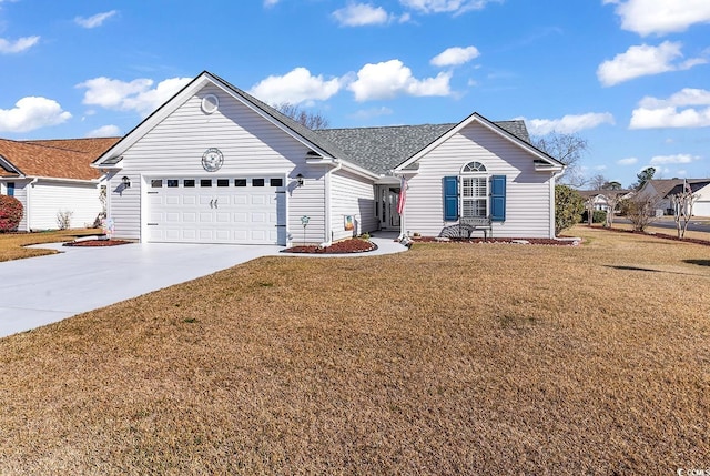 ranch-style home with a garage, concrete driveway, and a front lawn