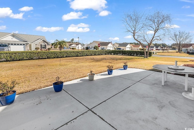 view of patio / terrace with a residential view