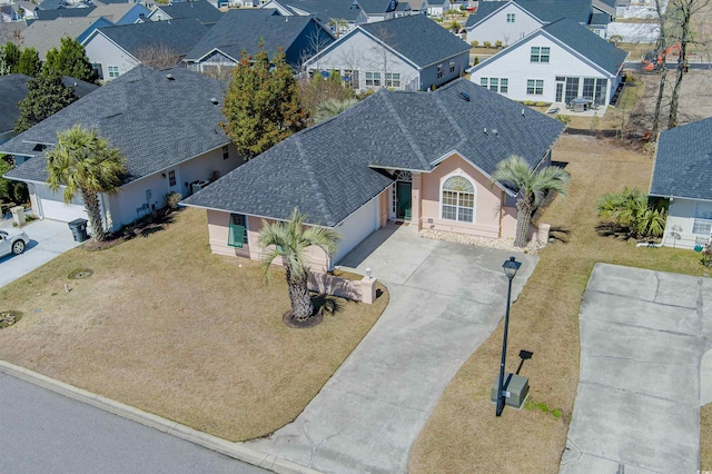 drone / aerial view with a residential view