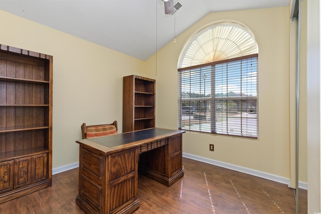 office with baseboards, dark wood-style flooring, and vaulted ceiling