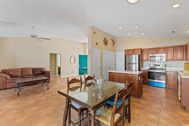 dining room with visible vents, recessed lighting, light tile patterned flooring, ceiling fan, and vaulted ceiling