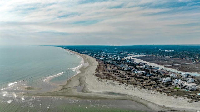 aerial view featuring a water view and a beach view