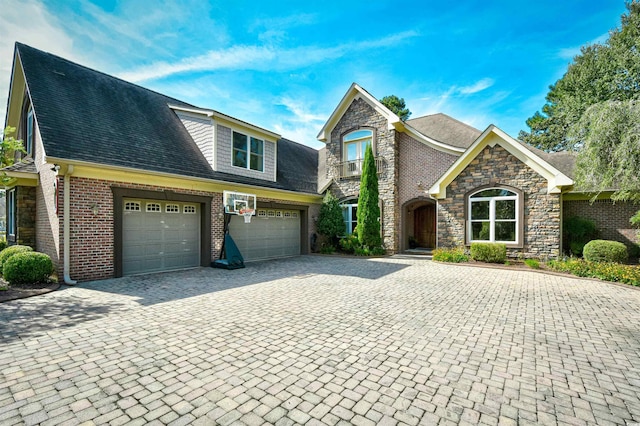 2085 Timmerman Rd, Myrtle Beach, SC 29588 - view of front of property with a garage, decorative driveway, stone siding, and a shingled roof