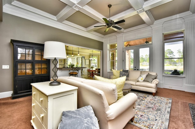 carpeted living area with beamed ceiling, french doors, coffered ceiling, and ceiling fan