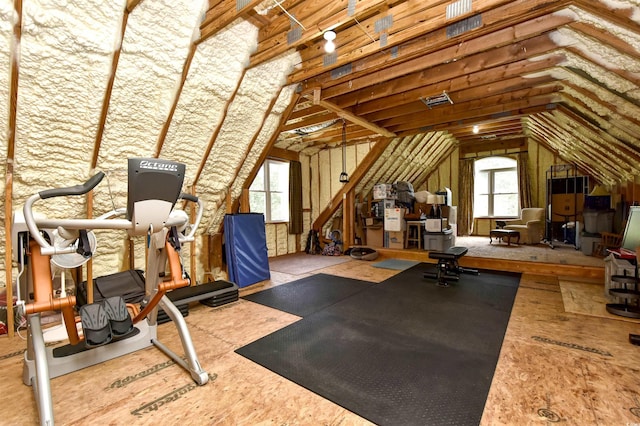 workout area featuring lofted ceiling