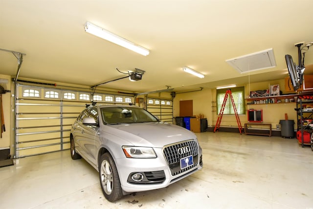 garage featuring a garage door opener