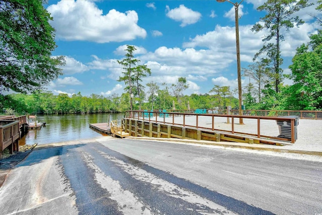 dock area featuring a water view