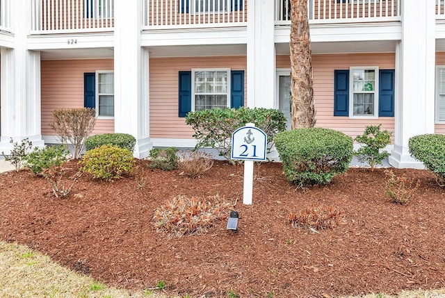 property entrance with a balcony