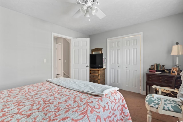 bedroom featuring a ceiling fan, a closet, and carpet floors