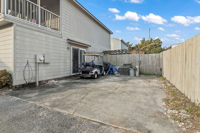 exterior space with a patio and a fenced backyard