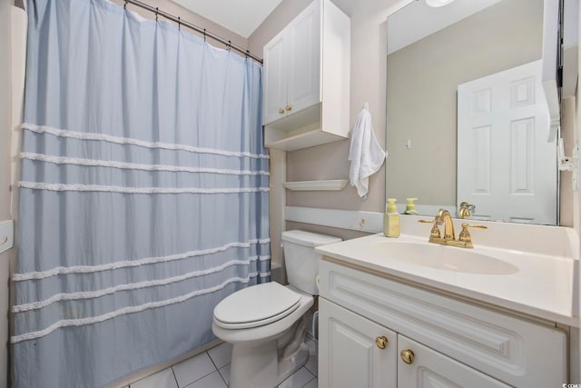 bathroom with tile patterned flooring, toilet, vanity, and a shower with curtain