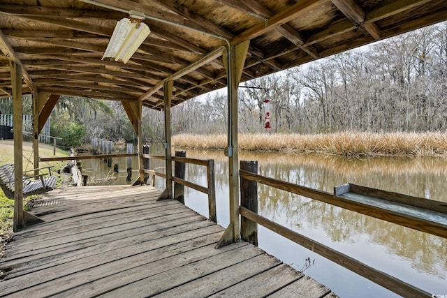 view of dock with a water view