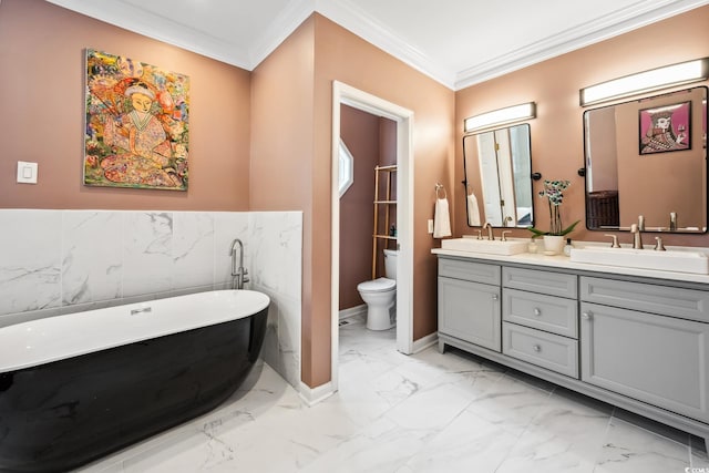 full bath with double vanity, crown molding, marble finish floor, and a sink