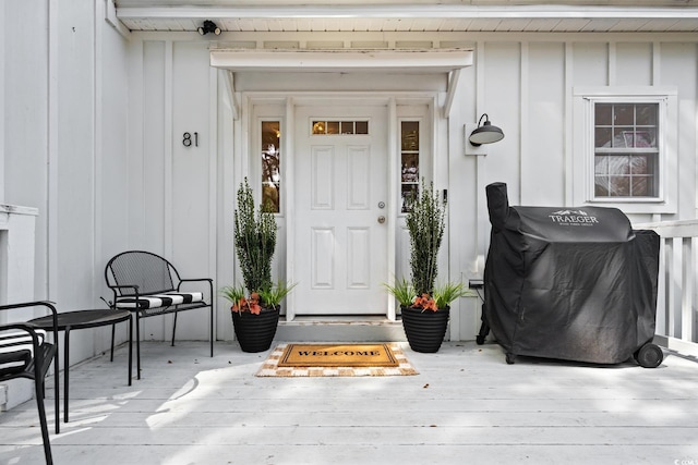 property entrance with board and batten siding