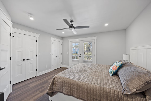 bedroom with two closets, baseboards, recessed lighting, dark wood-style floors, and a ceiling fan